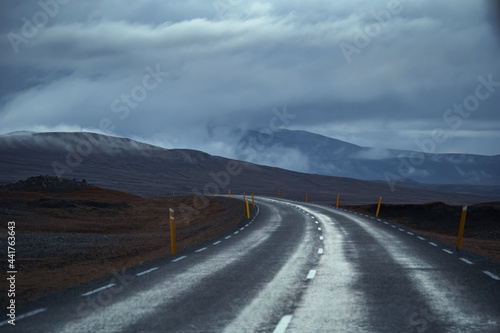 Drive car on road. Iceland travel. Beautiful nature icelandic landscape in the dusk