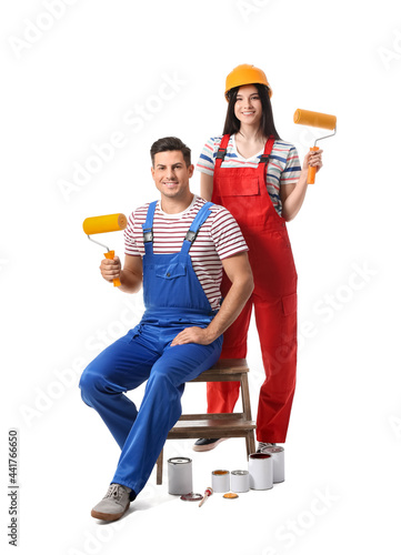 Young couple with rollers a...