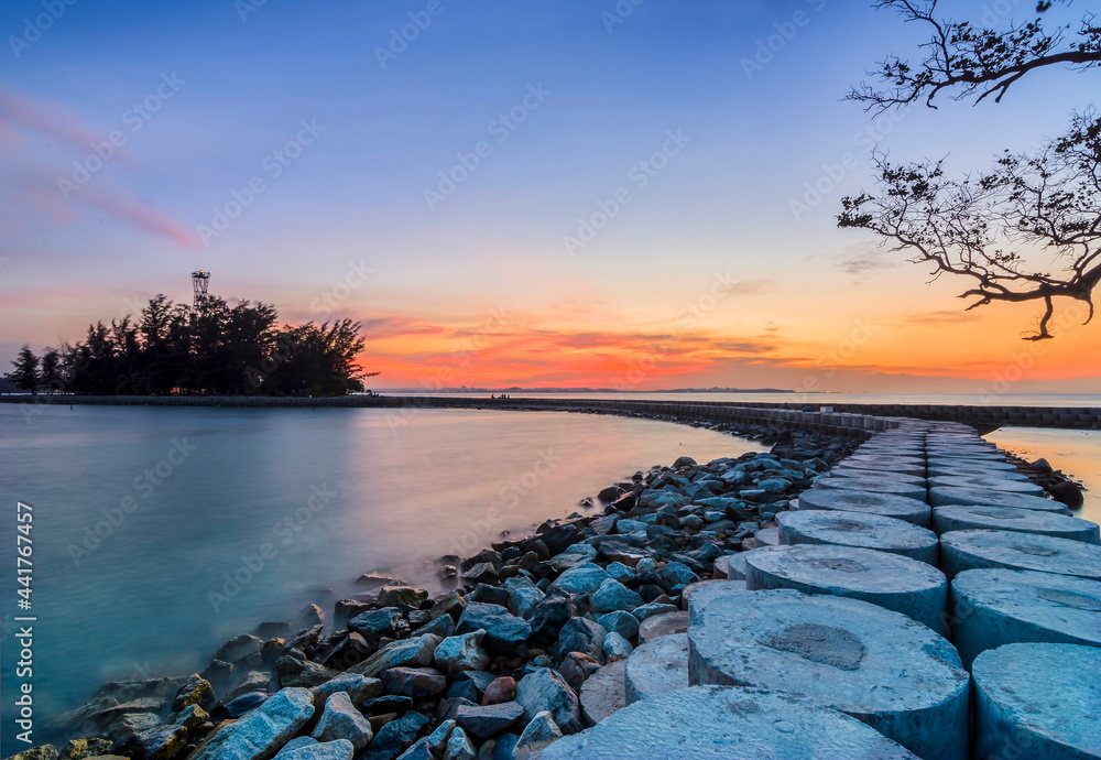Wave Breaker Pulau Putri Batam City in beautiful sunset