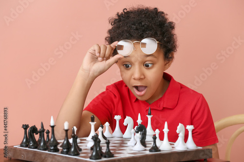 Cute African-American boy p...