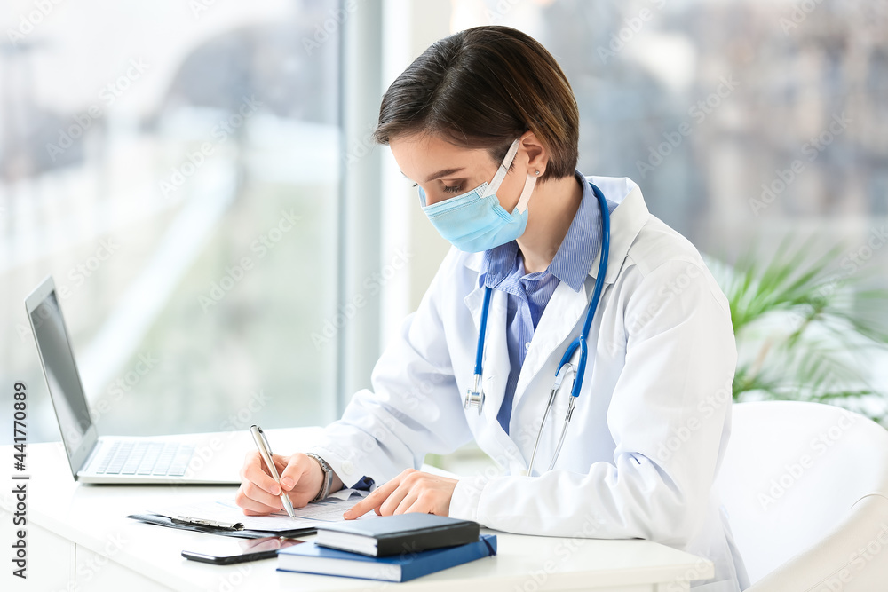 Female doctor working in clinic Female doctor working in clinic