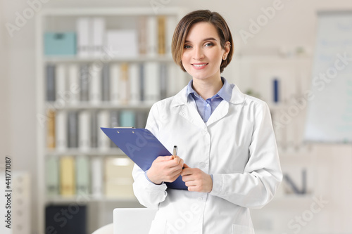 Female doctor working in cl...