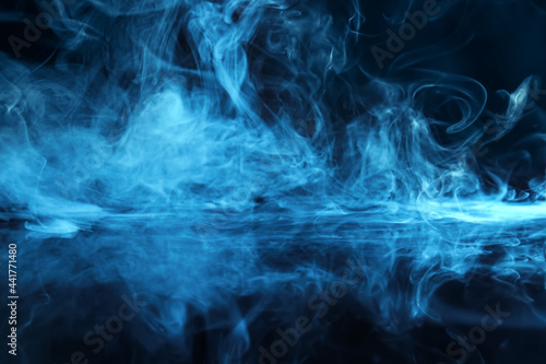 Smoke on dark color background, closeup