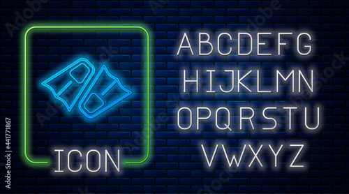 Glowing neon Rubber flippers for swimming icon isolated on brick wall background. Diving equipment. Extreme sport. Diving underwater equipment. Neon light alphabet. Vector