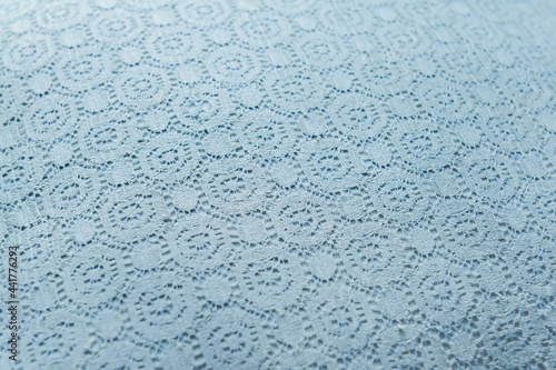 Texture of blue knitted fabric, closeup