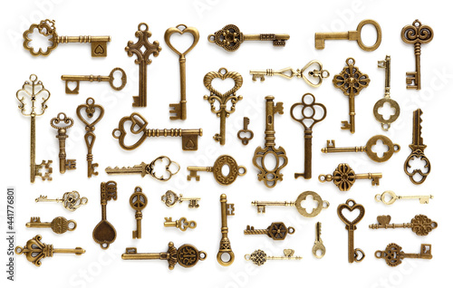 A pattern of antique, decorative, ornate keys. Isolated on a white