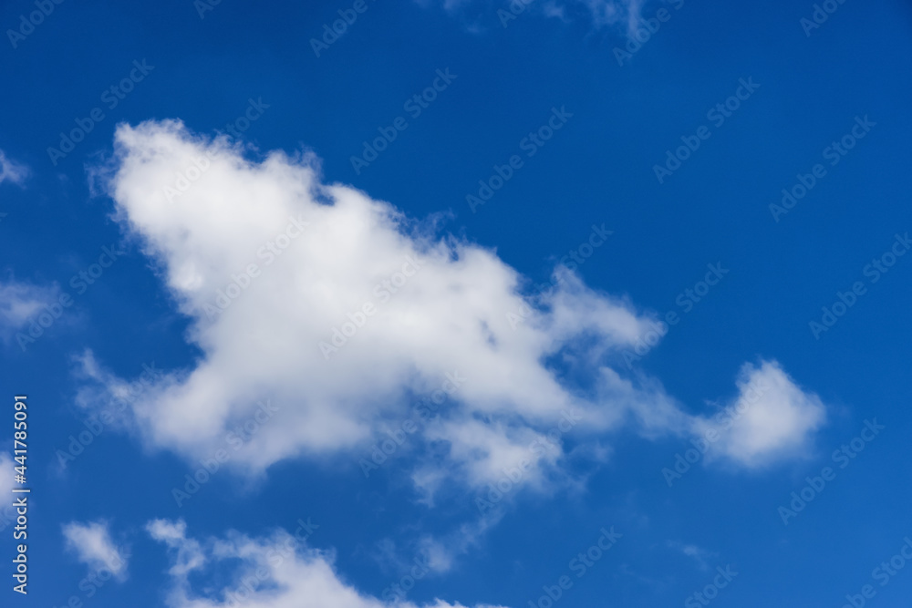 View of Cloudscape during a colorful and sunny spring day. Taken on the West Coast of British Columbia, Canada.