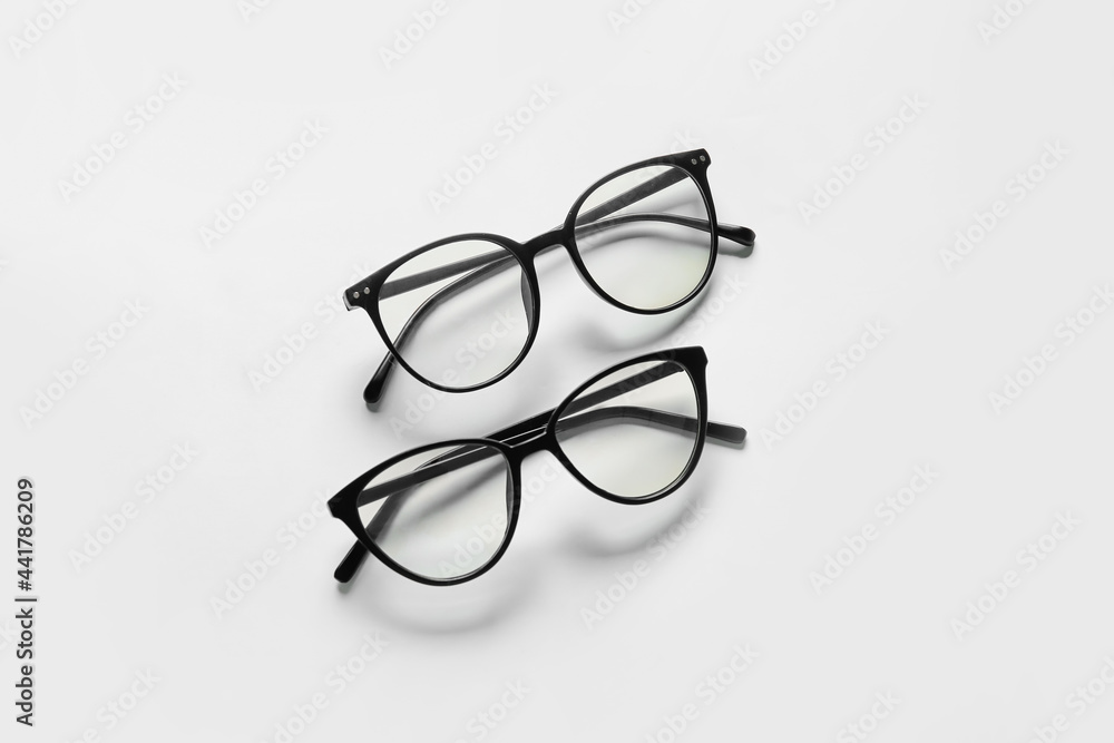 Different stylish eyeglasses on white background Different stylish eyeglasses on white background