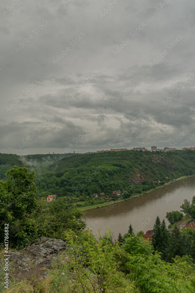 Fototapeta premium View for valley of Vltava river near Prague Sedlec in cloudy rainy morning