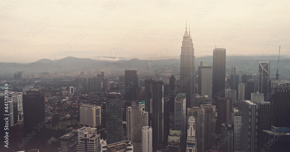 Aerial view. Panorama of Kuala Lumpur at sunset. Malaysia Cinematic style.