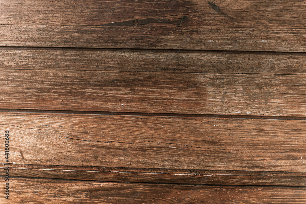 Fototapeta premium Drewniane brązowe tło, tekstura desek.