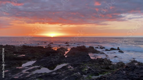 Sunset on the coast in Puerto de la Cruz, Tenerife, Spain photo
