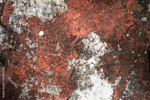 Czerwono brązowe tło, tekstura zniszczona brudna ściana, popękana struktura.