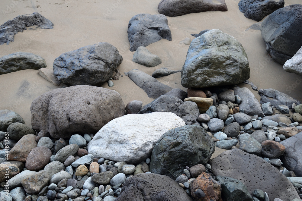 White Stone on Beach with Sand & Rocks White Stone on Beach with Sand & Rocks