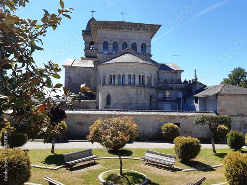 Jardines y parte posterior de la Iglesia parroquial de Guitiriz, Galicia photo