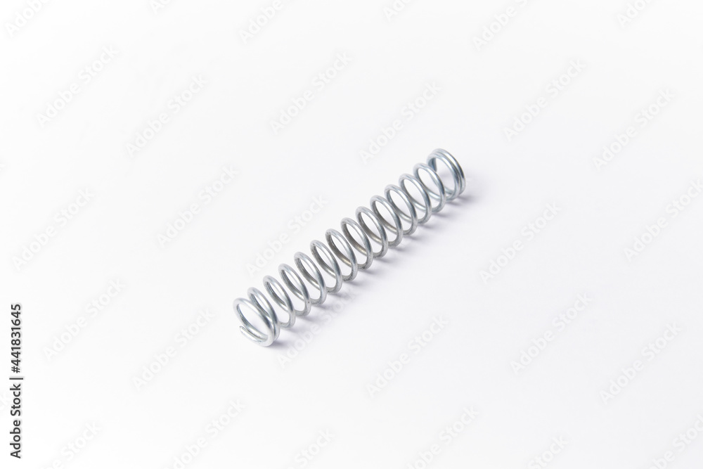 Metal spring isolated used to absorb compression forces Metal spring isolated used to absorb compression forces