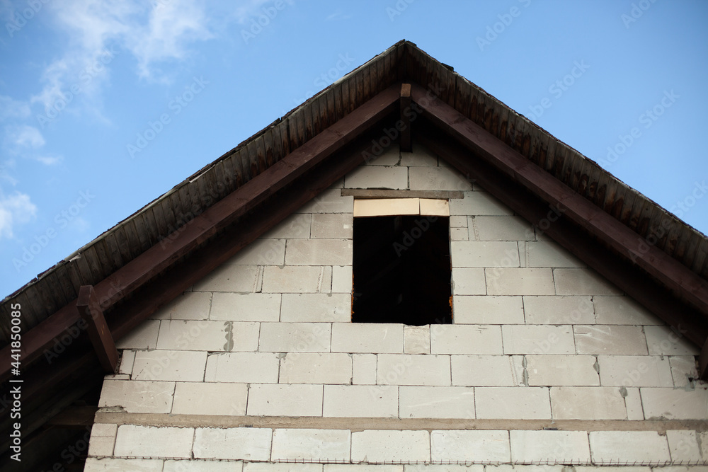 House made of concrete blocks. An unfinished country house. House made of concrete blocks. An unfinished country house.