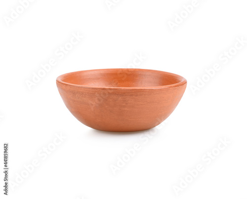 Close-up of soft clay pot over white background
