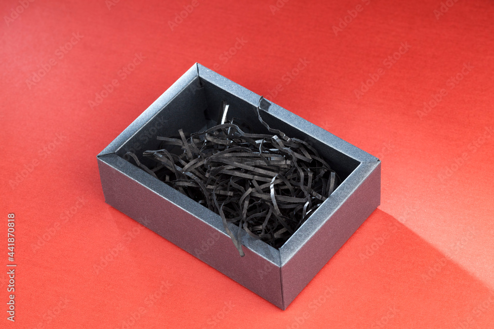 black box with cut lines of black paper black box with cut lines of black paper