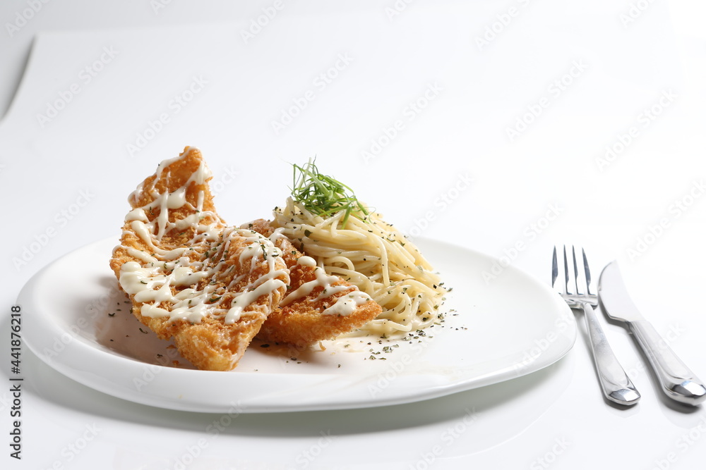 deep fried golden crispy fish fillet in tartar sauce with carbonara pasta noodle western seafood cuisine menu deep fried golden crispy fish fillet in tartar sauce with carbonara pasta noodle western seafood cuisine menu