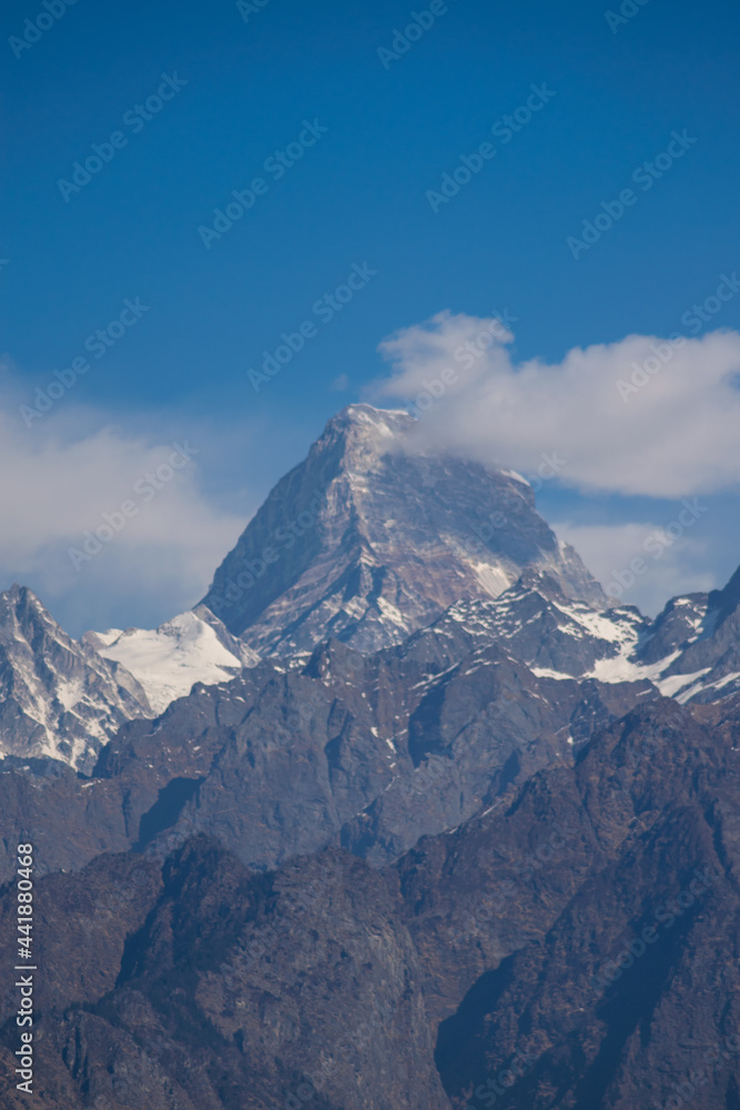 snow covered himalayan peaks on a bright sunny day snow covered himalayan peaks on a bright sunny day