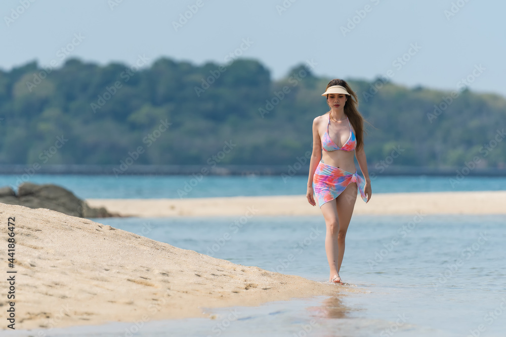 Portrait of thai woman posing outdoors at the sea beach Portrait of thai woman posing outdoors at the sea beach
