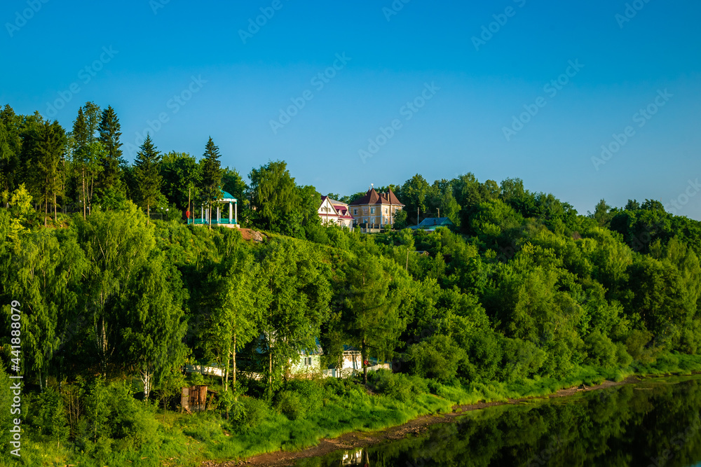 beautiful little houses are located on the picturesque steep bank of the river beautiful little houses are located on the picturesque steep bank of the river