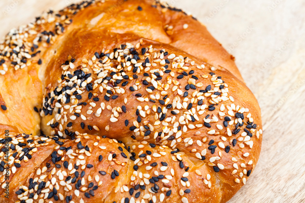 wheat bun sprinkled with sesame and flax wheat bun sprinkled with sesame and flax