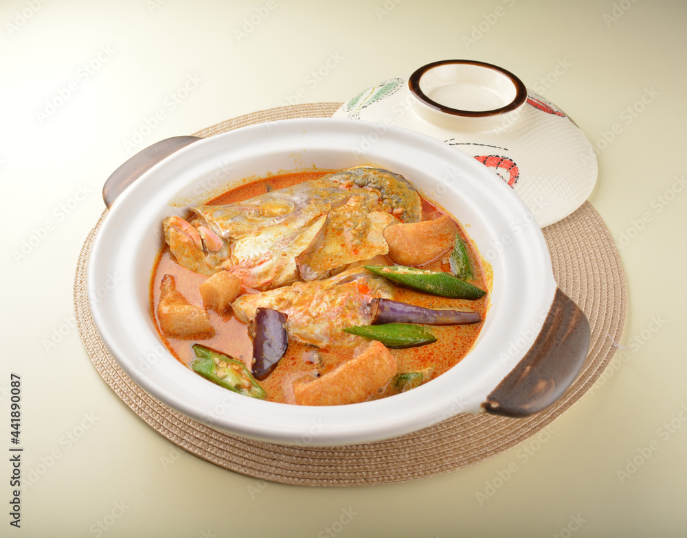 chef cook home style nyonya spicy curry grouper fish head with vegetables in big clay pot asian Chinese banquet halal seafood steamboat cafe restaurant menu chef cook home style nyonya spicy curry grouper fish head with vegetables in big clay pot asian Chinese banquet halal seafood steamboat cafe restaurant menu