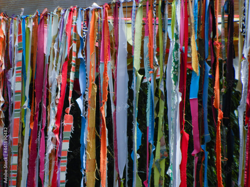 Variety of fabrics hanging artistically on a rope