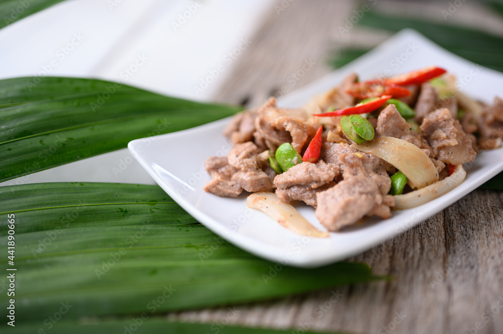 Stir Fried Pork with Shrimp Paste and bitter beans. Stir Fried Pork with Shrimp Paste and bitter beans.