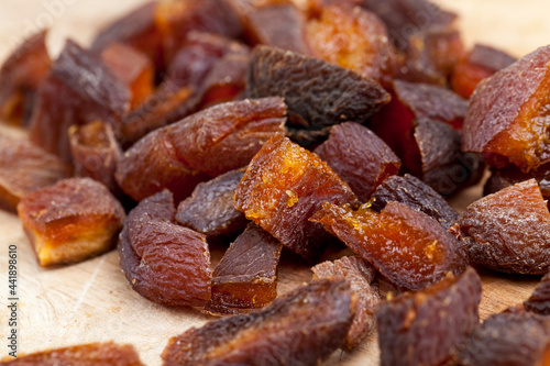 dried apricot fruits cut into pieces during cooking