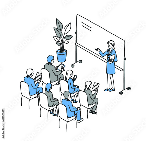 セミナーを受講するスーツ姿の男性と女性