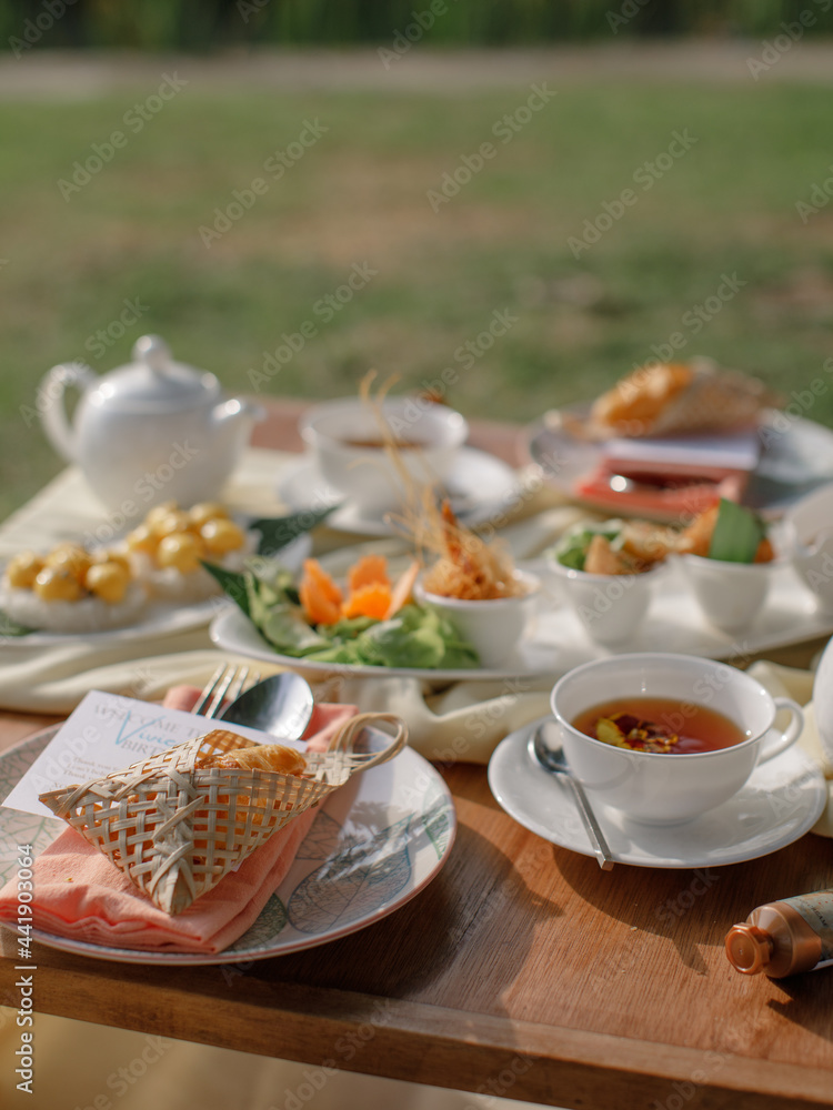 Fototapeta premium Picnic outdoors in the garden