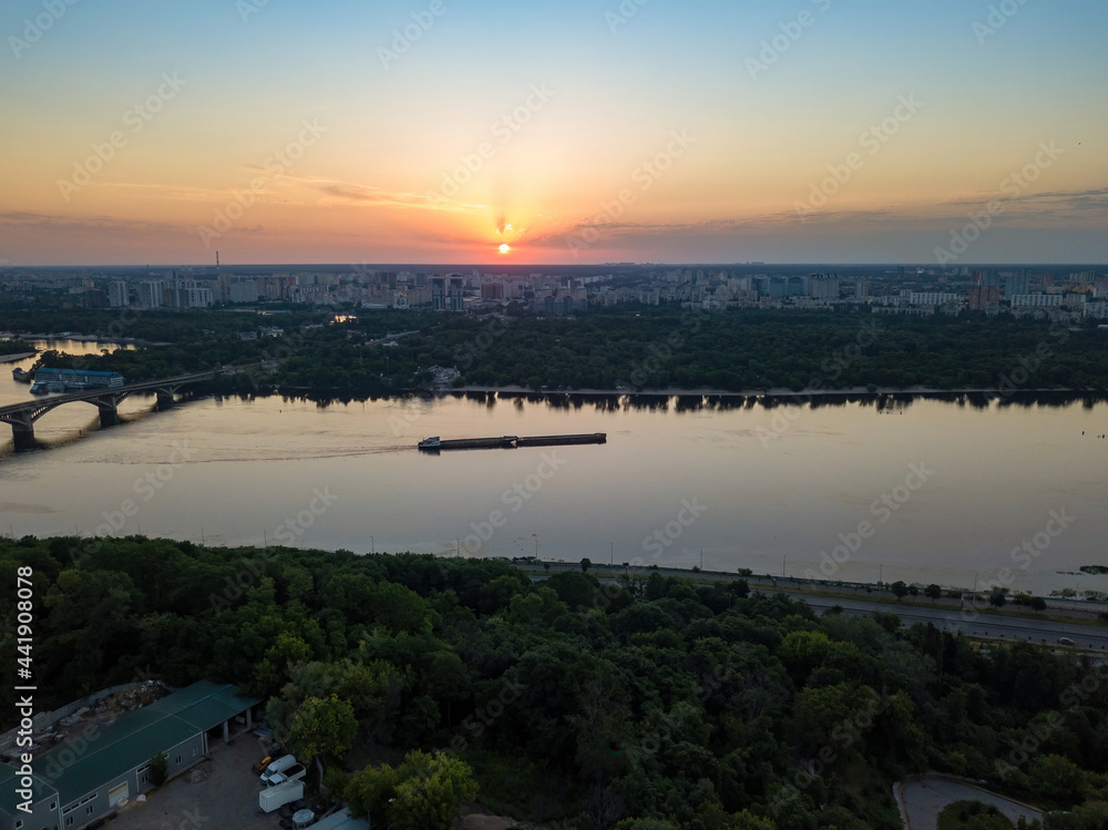 Dnieper river in Kiev at dawn. Clear morning. Aerial drone view.