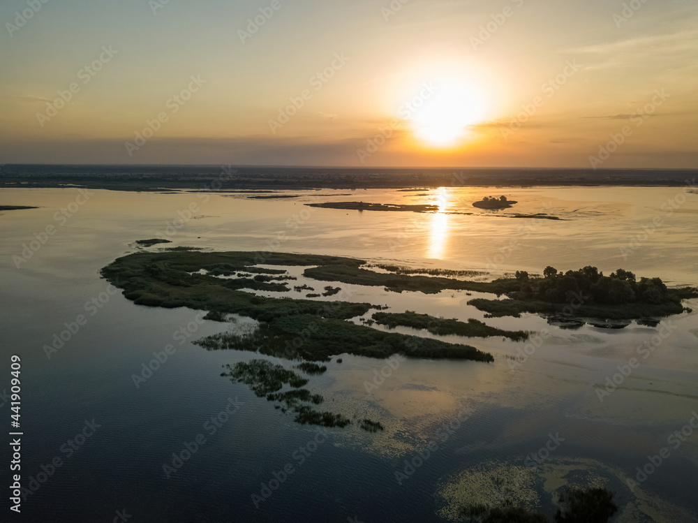 Sunrise over the wide river Dnieper. Aerial drone view.