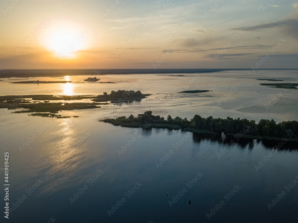 Sunrise over the wide river Dnieper. Aerial drone view. Sunrise over the wide river Dnieper. Aerial drone view.