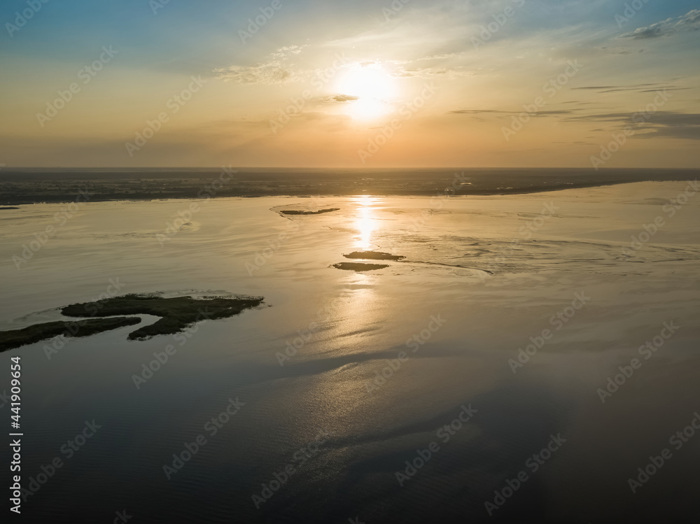 Sunrise over the wide river Dnieper. Aerial drone view. Sunrise over the wide river Dnieper. Aerial drone view.