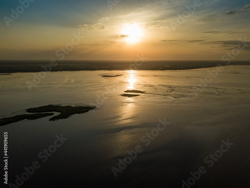 Sunrise over the wide river Dnieper. Aerial drone view.