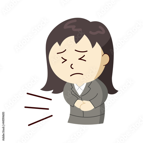 痛みでお腹を押さえるスーツ姿の女性