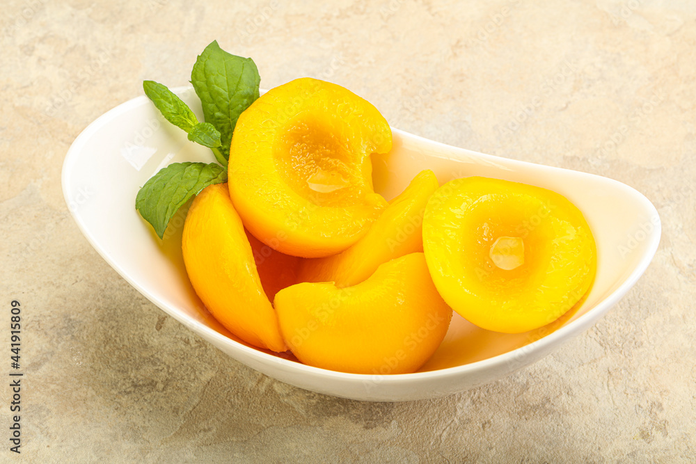 Sweet ripe canned peaches with mint Sweet ripe canned peaches with mint