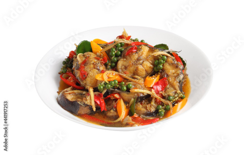 Stir fried spicy cat fish in white ceramic dish on white background