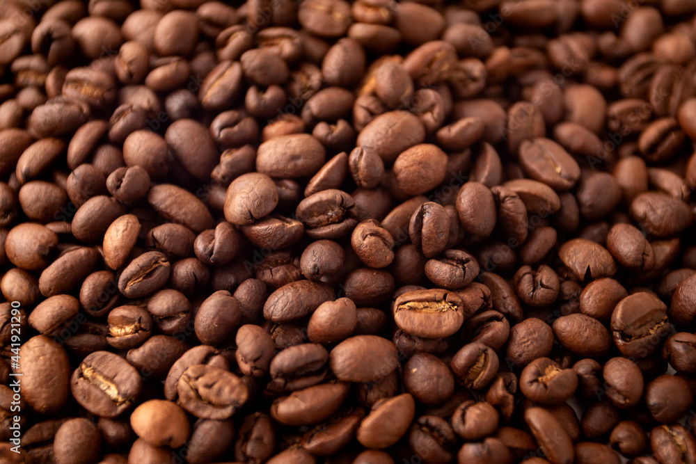 Coffee beans background. Roasted coffee fullframe. Texture of dark coffee beans. Coffee beans background. Roasted coffee fullframe. Texture of dark coffee beans.