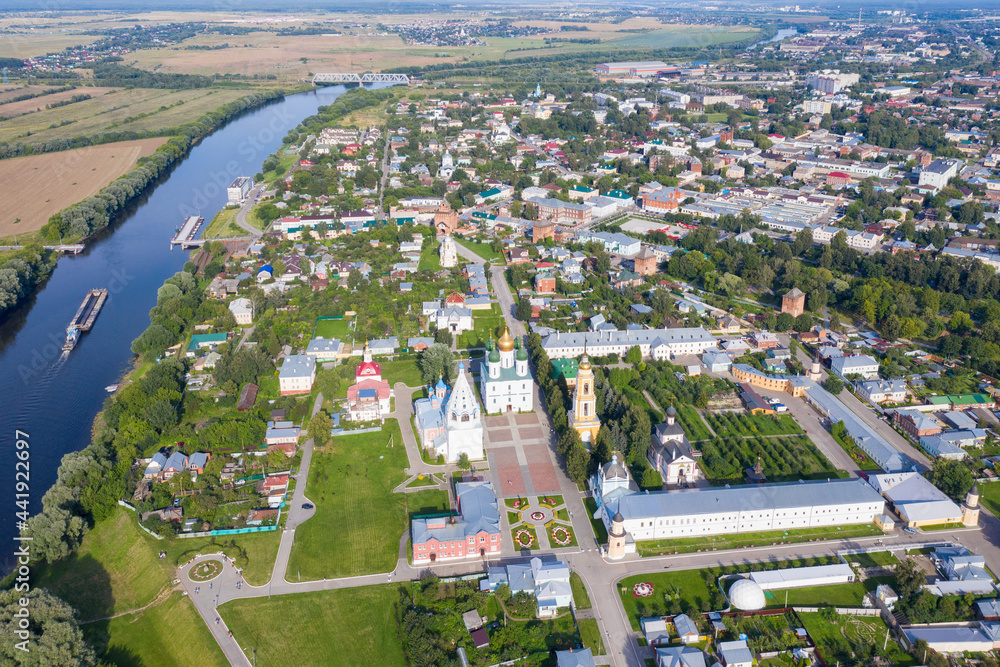 Aerial view of Kolomna town and a barge floating on Moscow river. Moscow Oblast, Russia.