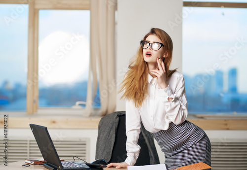 woman secretary office desk laptop technology