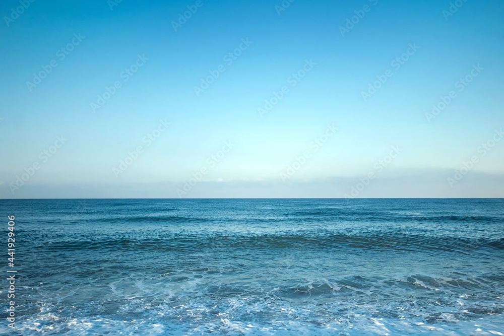 View of the ocean or sea in blue in the morning. Relaxation, calmness concept. Copy space.