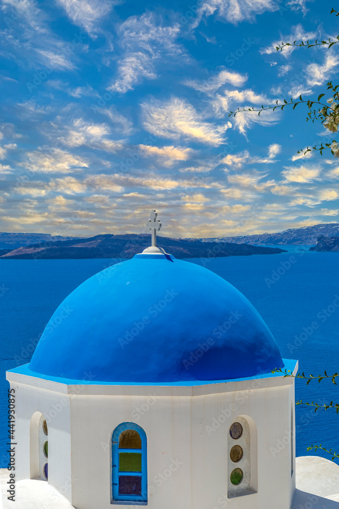White and blue architecture with domes and churches in Oia, Santorini, Greece