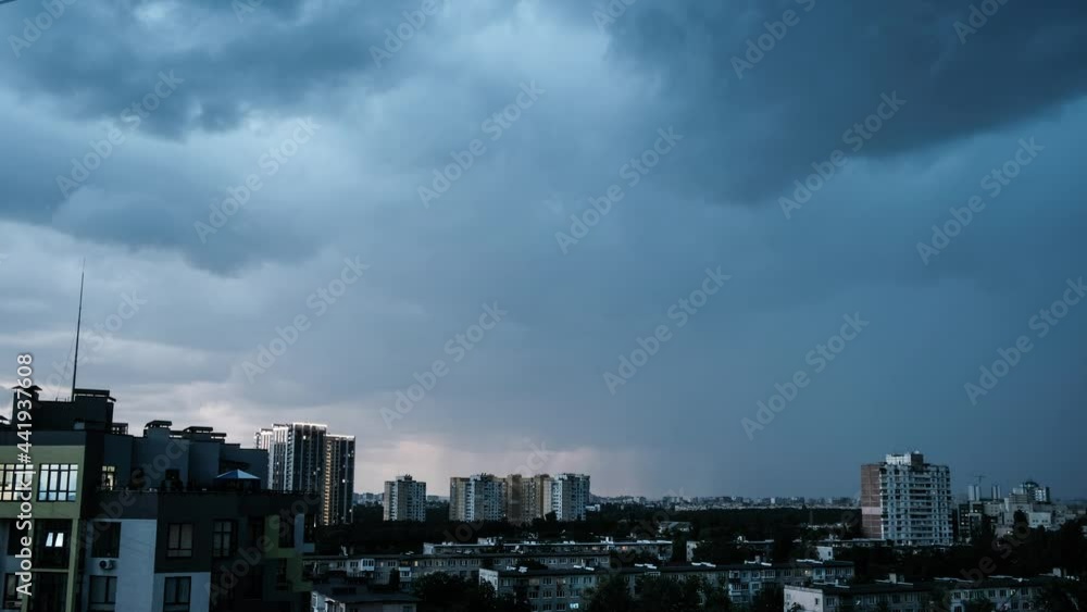 A dark storm clouds above city buildings - timelapse video. Kyiv, Ukraine. Summer stormy weather, urban, time lapse. A dark storm clouds above city buildings - timelapse video. Kyiv, Ukraine. Summer stormy weather, urban, time lapse.
