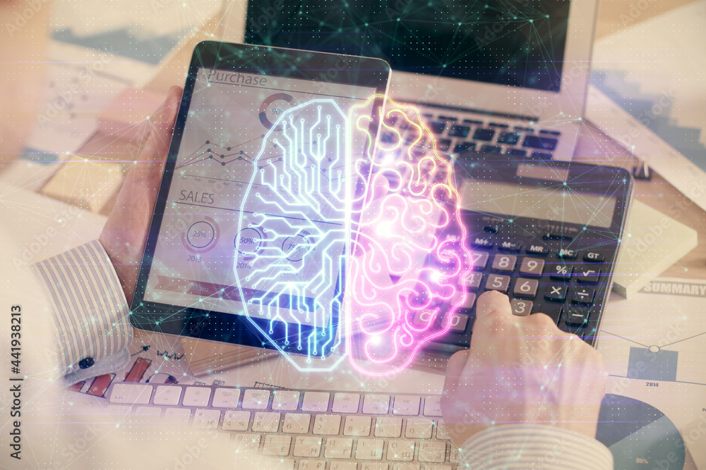 Double exposure of man's hand holding and using a digital device and brain hologram drawing. Data concept. Double exposure of man's hand holding and using a digital device and brain hologram drawing. Data concept.