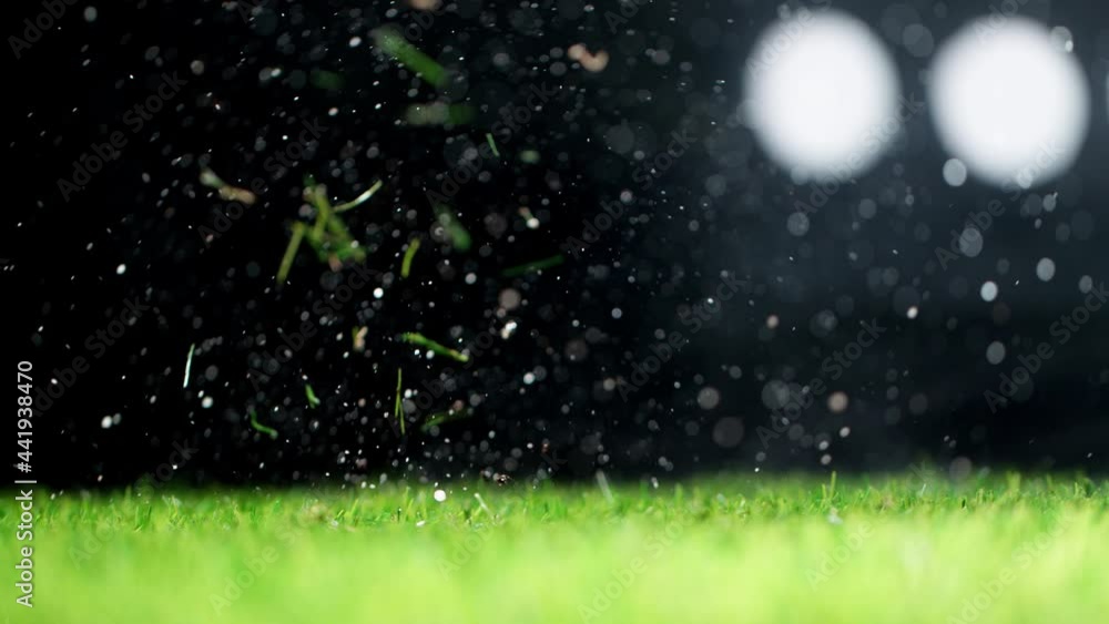 Super slow motion of falling soccer ball on lawn. Speed ramp effect. Filmed on high speed cinema camera, 1000fps.